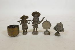 Two Oriental naive bronze figures, together with two Tibetan white metal vessels and a small