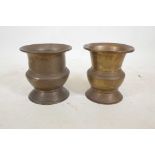 Two Indian spun brass vessels, 9½" high