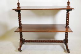 A C19th mahogany two tier buffet, raised on twisted columns and cabriole supports with scroll