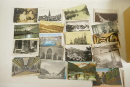 A box of vintage postcards, mainly European and Hong Kong, approximately 400