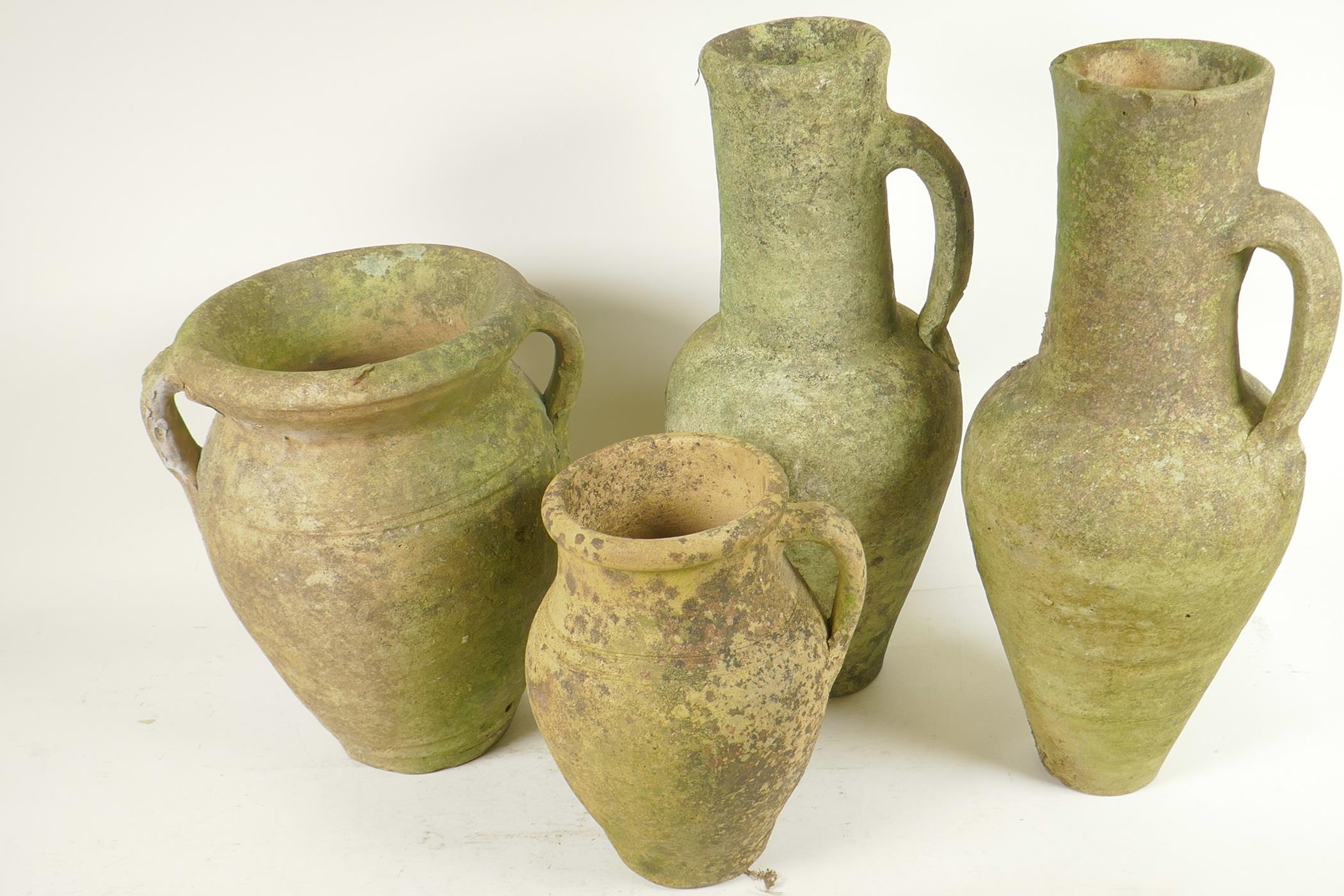 Four terracotta garden ornaments, a pair of Grecian style jugs, 15" high, a two handled vase and a - Image 2 of 2