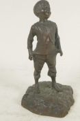 A small bronze figure of a boy, 6½" high