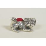 A sterling silver pincushion in the form of a pug/bulldog, 1" long