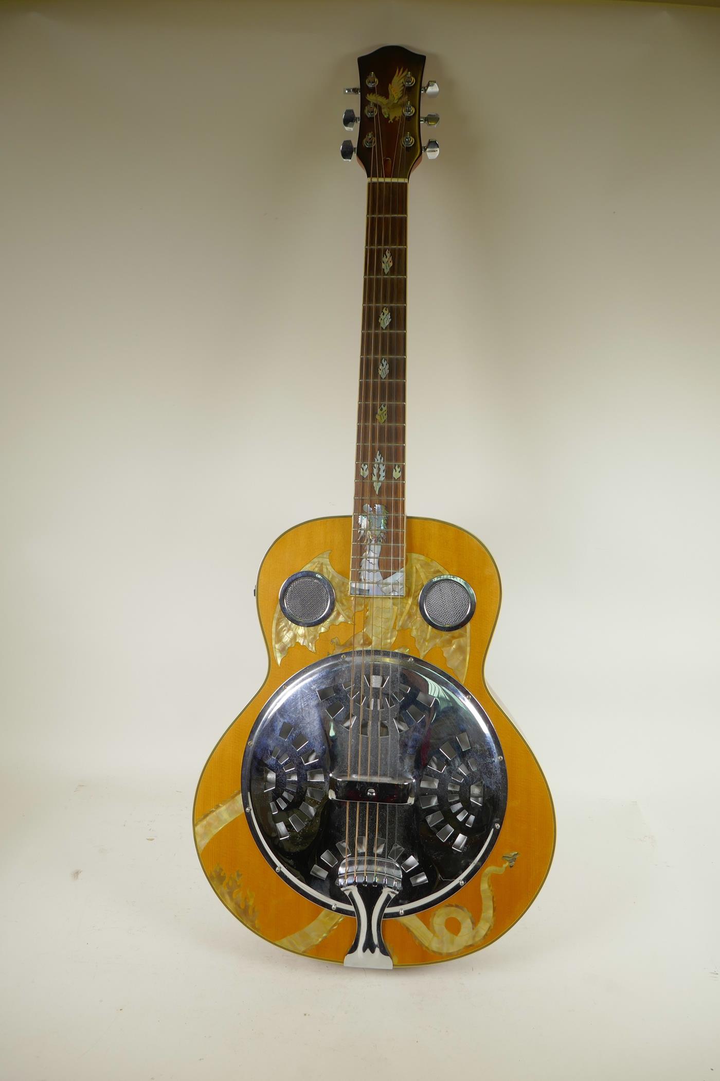 A semi acoustic Resonator 6 string guitar with mother of pearl inlay depicting a dragon and hawk,