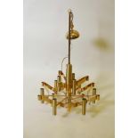 A brass pendant ceiling light with nine bulb holders, A/F in the style Gaetano Sciolari, A/F,