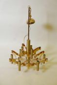 A brass pendant ceiling light with nine bulb holders, A/F in the style Gaetano Sciolari, A/F,