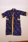 A Chinese blue silk robe decorated with auspicious symbols and assorted vessels, 50", A/F