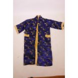 A Chinese blue silk robe decorated with auspicious symbols and assorted vessels, 50", A/F