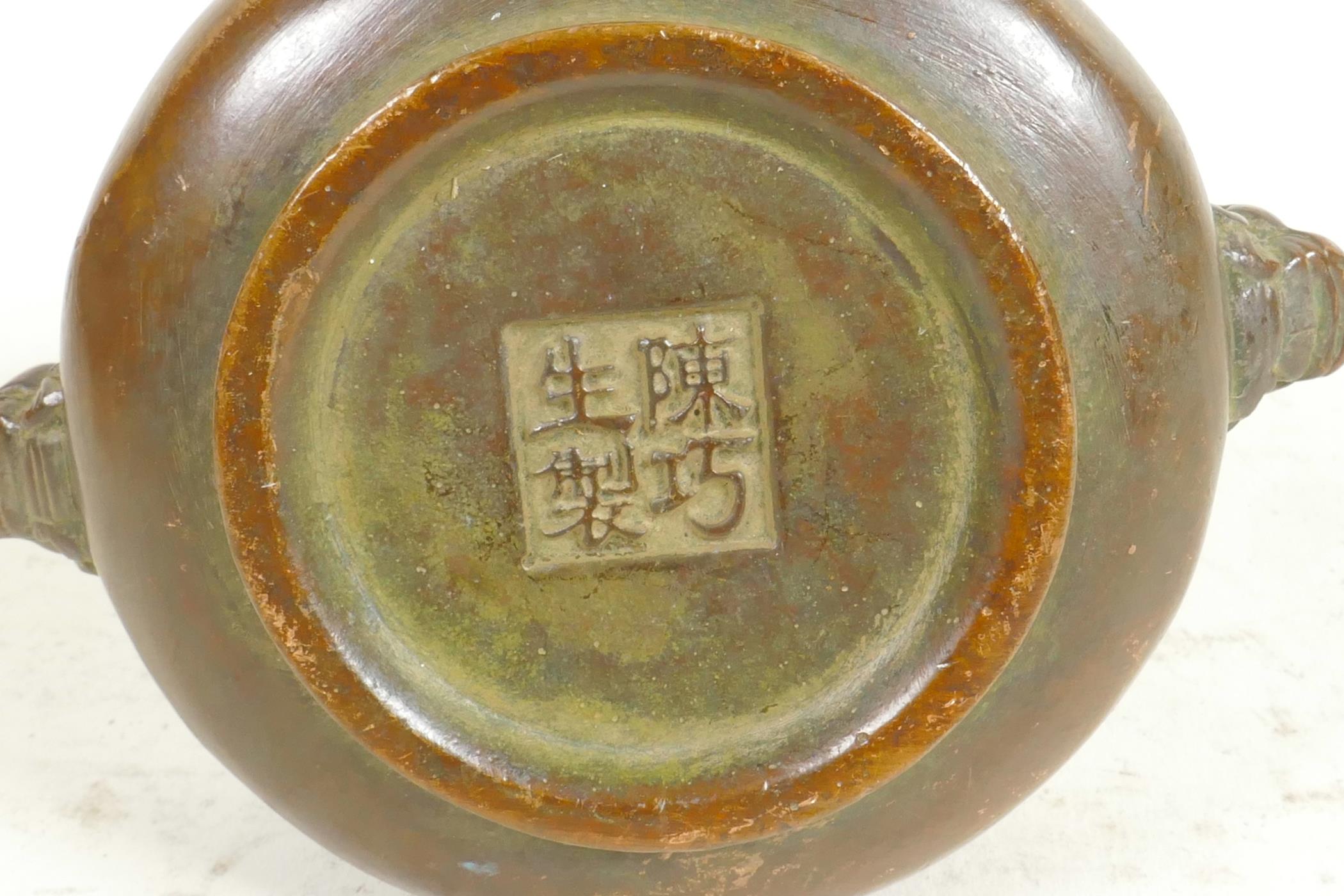 A Chinese miniature bronze censer with cast lion's mask handles, seal mark to base, 3" diameter - Image 3 of 3