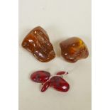A pair of cherry amber cufflinks, and two reconstituted amber shards, 2½" largest