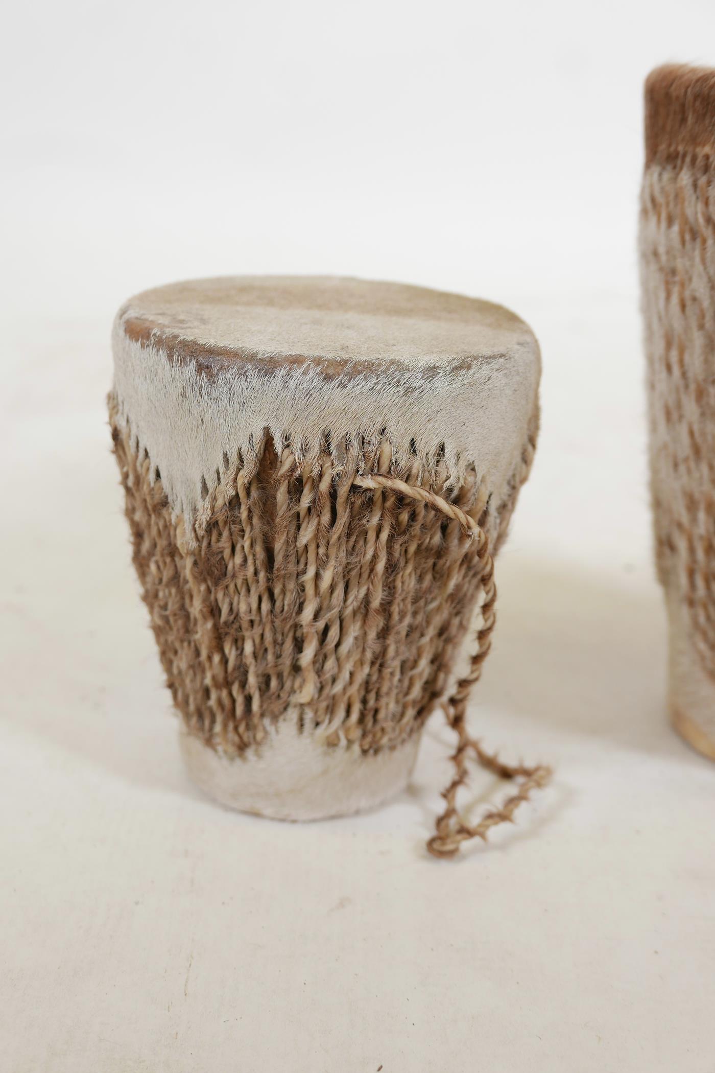 A pair of African hide drums and another larger, 9" high - Image 2 of 4