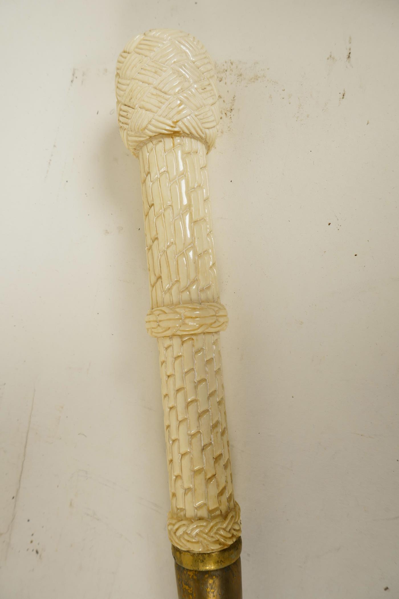 A hardwood walking cane with bone handle carved as wickerwork, 39" long - Image 2 of 2