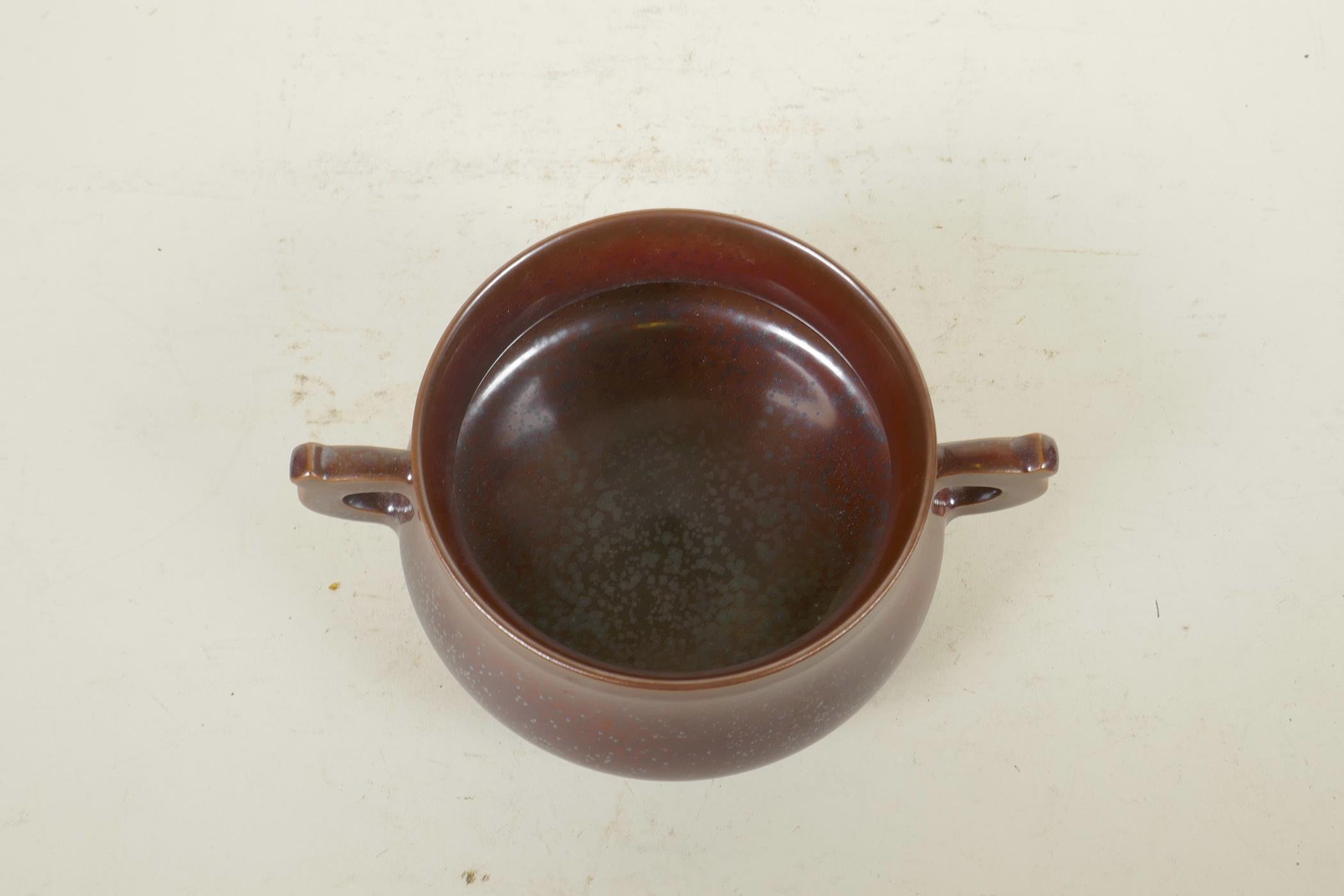 A Chinese copper glazed porcelain censer with two handles, raised on tripod supports, impressed seal - Image 6 of 6