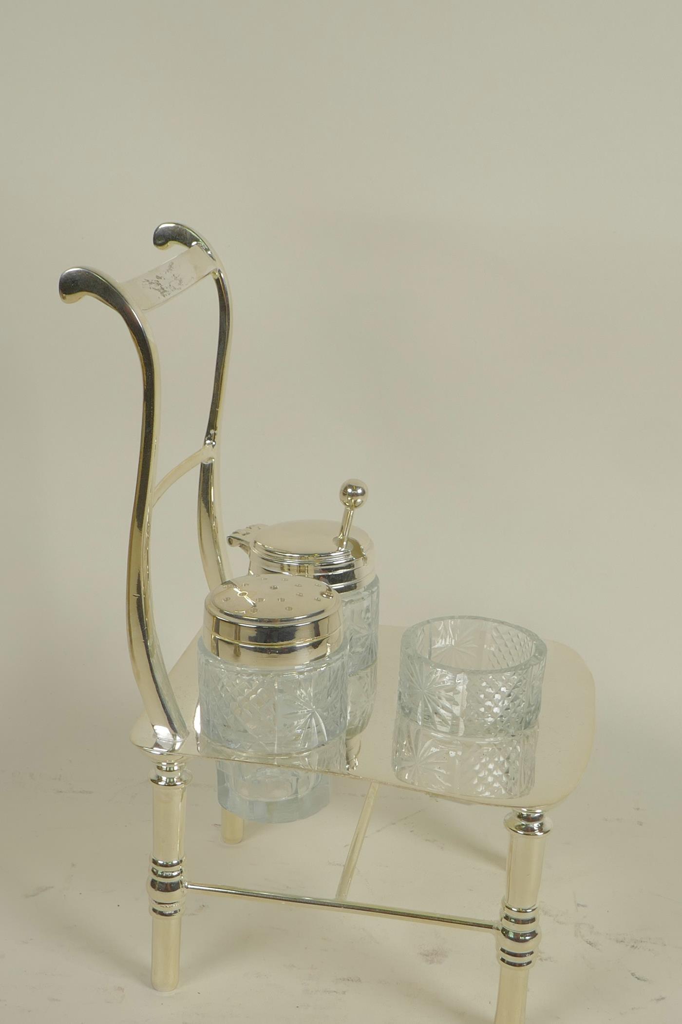 A silver plated cruet, the stand in the form of a bar back chair, 8" high - Image 3 of 3
