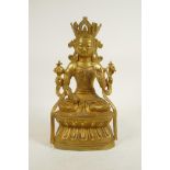 A Sino-Tibetan gilt bronze of Buddha seated in meditation, double vajra mark to base, 11½" high