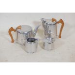 A Picquot ware four piece teaset including a lidded sugar bowl, water jug 7" high