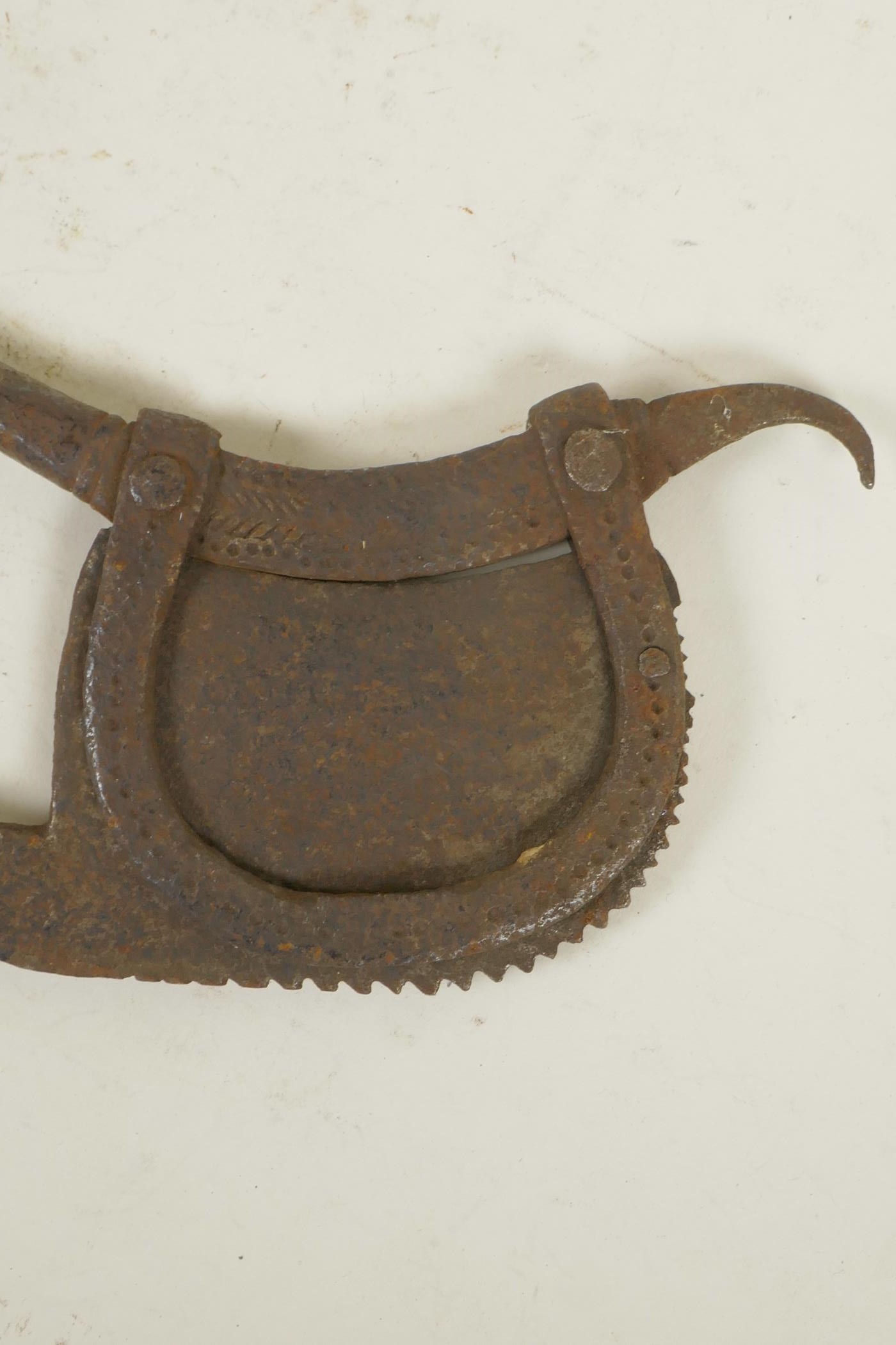 An antique Indian iron betel nut cutter, together with a metal oil ladle, 16" longest - Image 4 of 4