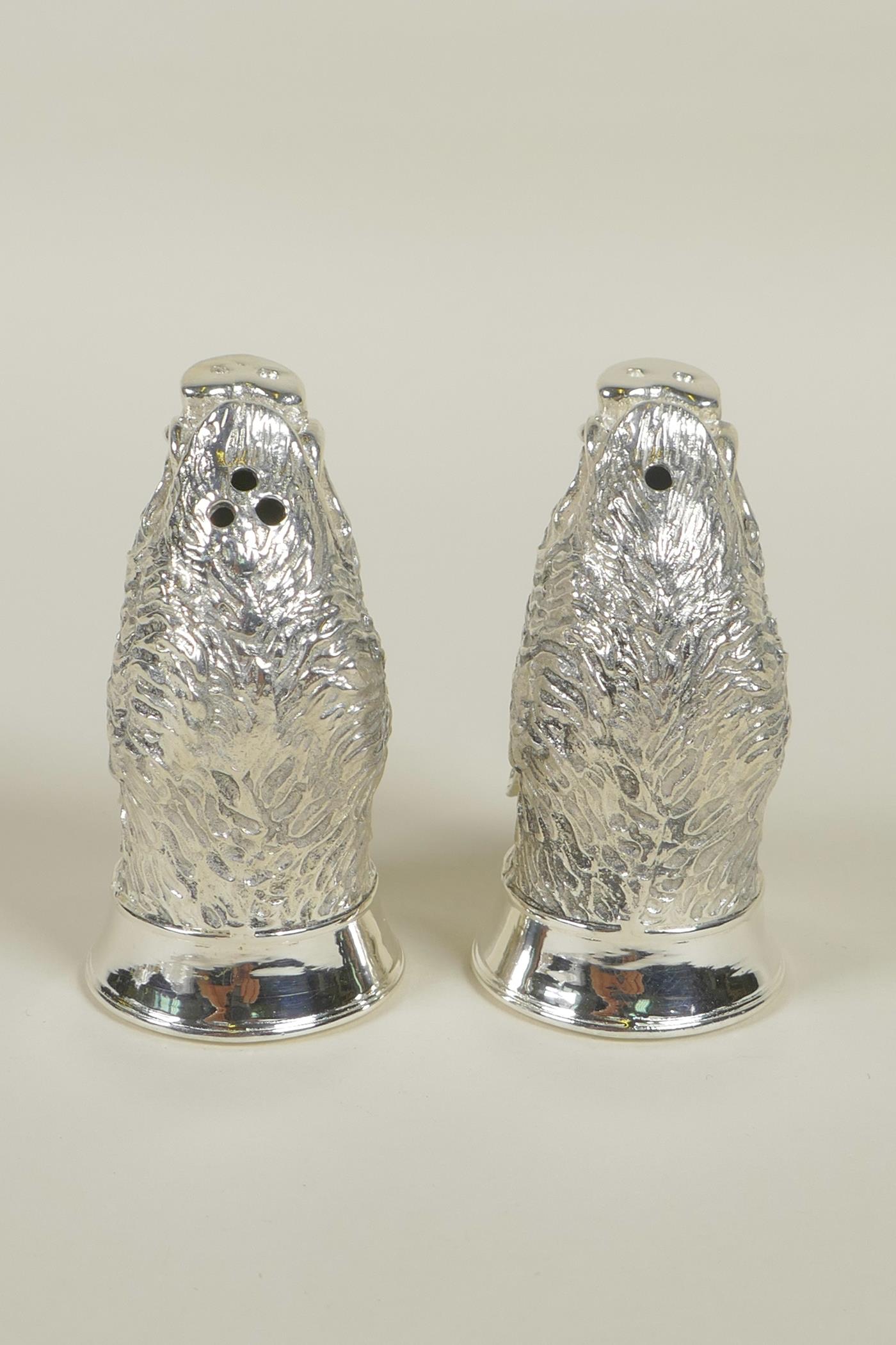 A pair of silver plated salt and pepper cruets in the form of boars' heads, 2" long - Image 3 of 4