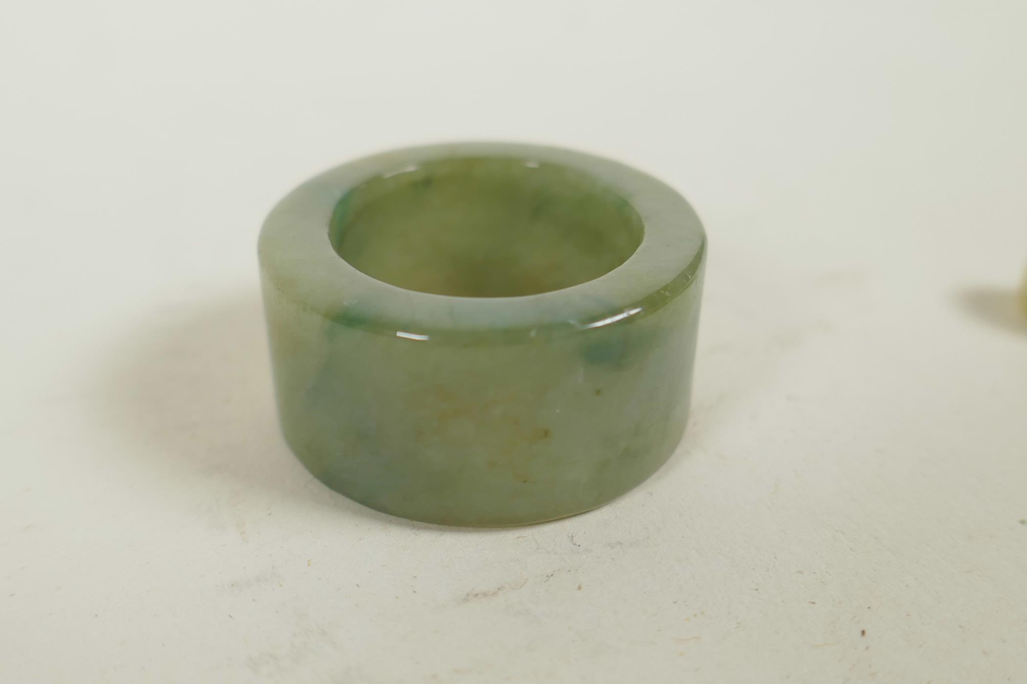A Chinese green jade archer's ring and a carved jade dragon pendant, largest 3" - Image 3 of 3