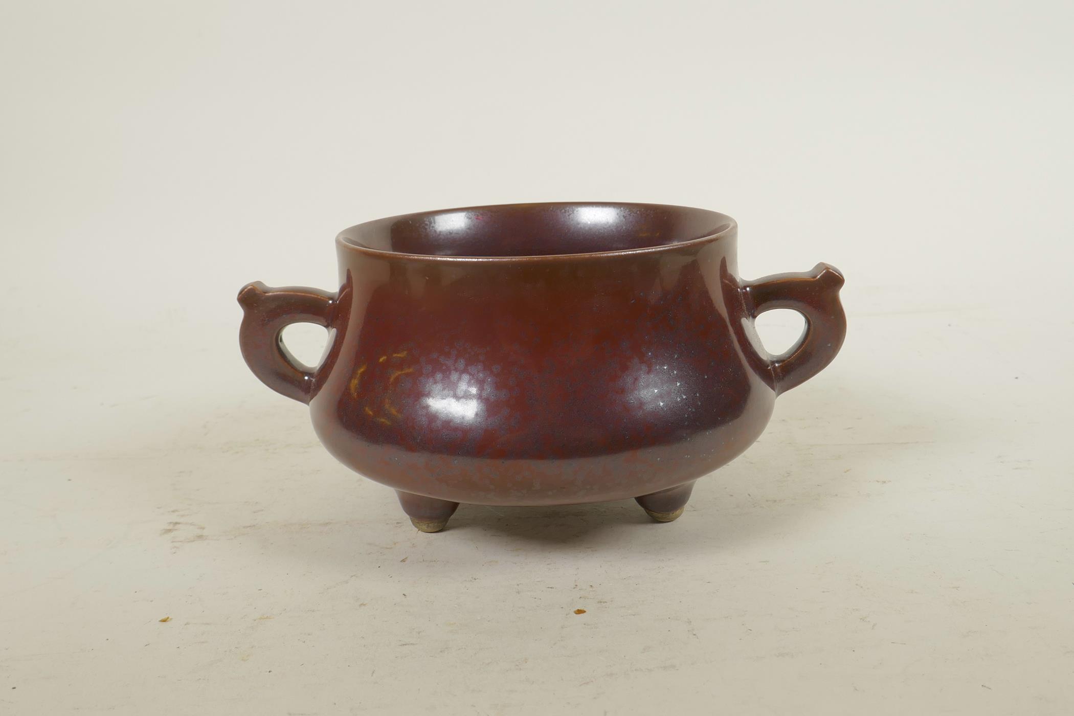 A Chinese copper glazed porcelain censer with two handles, raised on tripod supports, impressed seal - Image 3 of 6