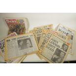 A collection of 1980 newspapers relating to the murder of John Lennon, together with a larger
