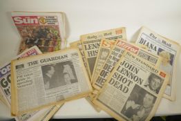 A collection of 1980 newspapers relating to the murder of John Lennon, together with a larger