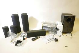 An Onkyo TX-SR507 AV receiver with home theatre surround sound system comprising a subwoofer,