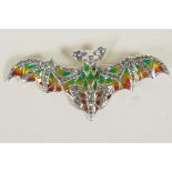 A silver and plique a jour brooch in the form of a bat, 3" wide