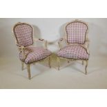 A pair of Louis style open arm chairs