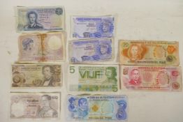 A quantity of world banknotes including 20 and 5 French francs, Dutch 5 guilder, Austrian 20