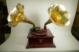 A replica twin horn wind up gramophone with brass horn, 17" square