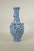 A Chinese duck egg blue glazed porcelain vase with applied peach tree decoration, seal mark to base,