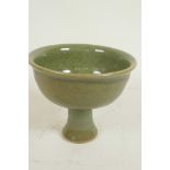 A Chinese celadon glazed porcelain stem bowl, 4½" high, 5½" diameter