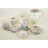 Eight pieces of decorative Poole Pottery including water jug and lidded jam pot