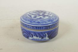 A Chinese blue and white porcelain cylinder box and cover with dragon decoration, 6 character mark