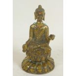 A small Chinese brass figurine of Buddha seated in meditation embellished with turquoise and coral