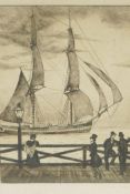 A black and white etching, figures on a dock watching a Baltic sailing cutter, pencil signed