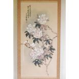 A Chinese painted scroll depicting white roses signed with calligraphy and red seal mark, 41" x 20"