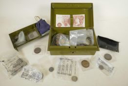 Of numismatic interest, a quantity of British coins including a replica Elizabeth I sixpence, eleven