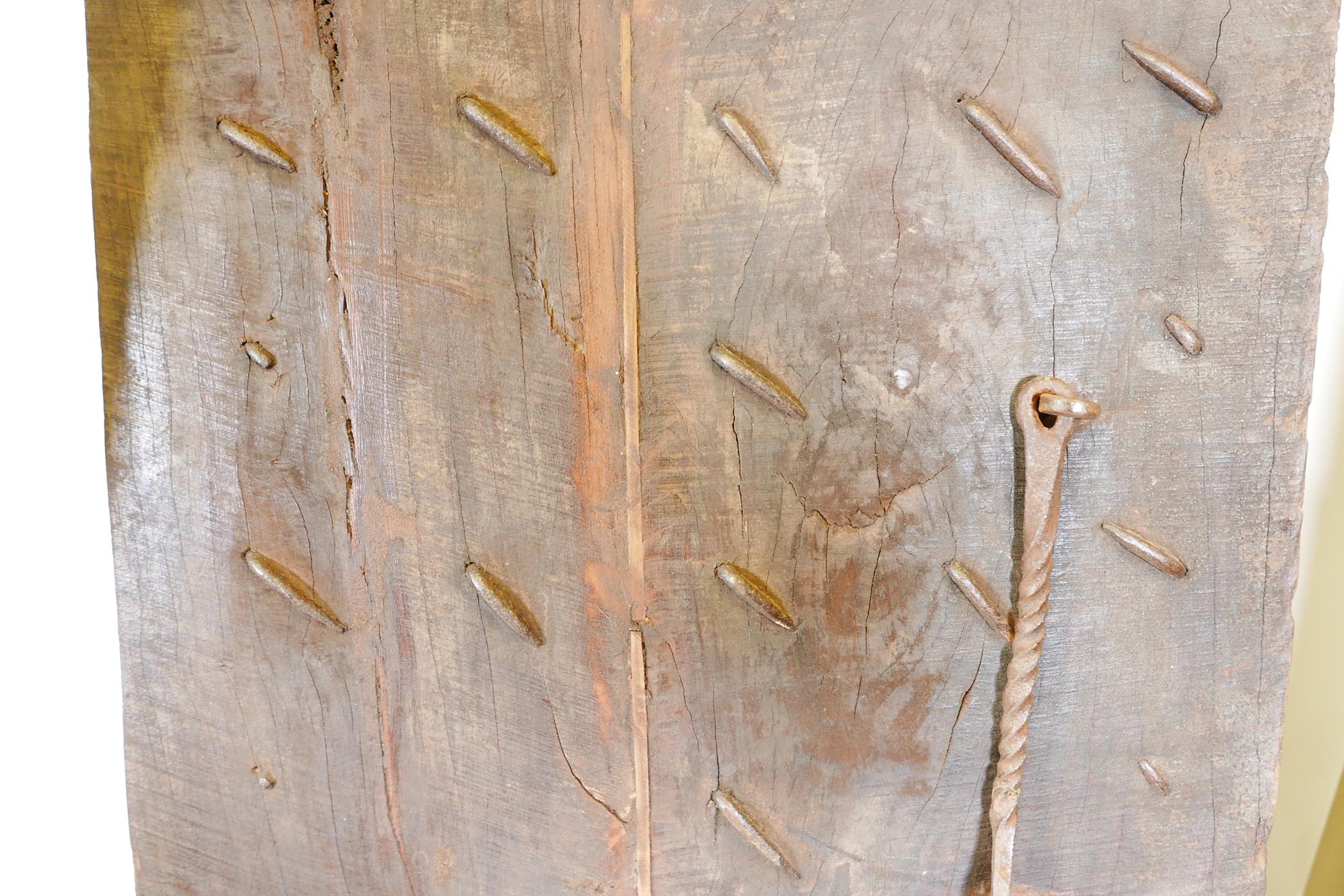 Architectural salvage: A pair of Indian hardwood panelled storm doors, with brass sheathed iron - Image 12 of 12