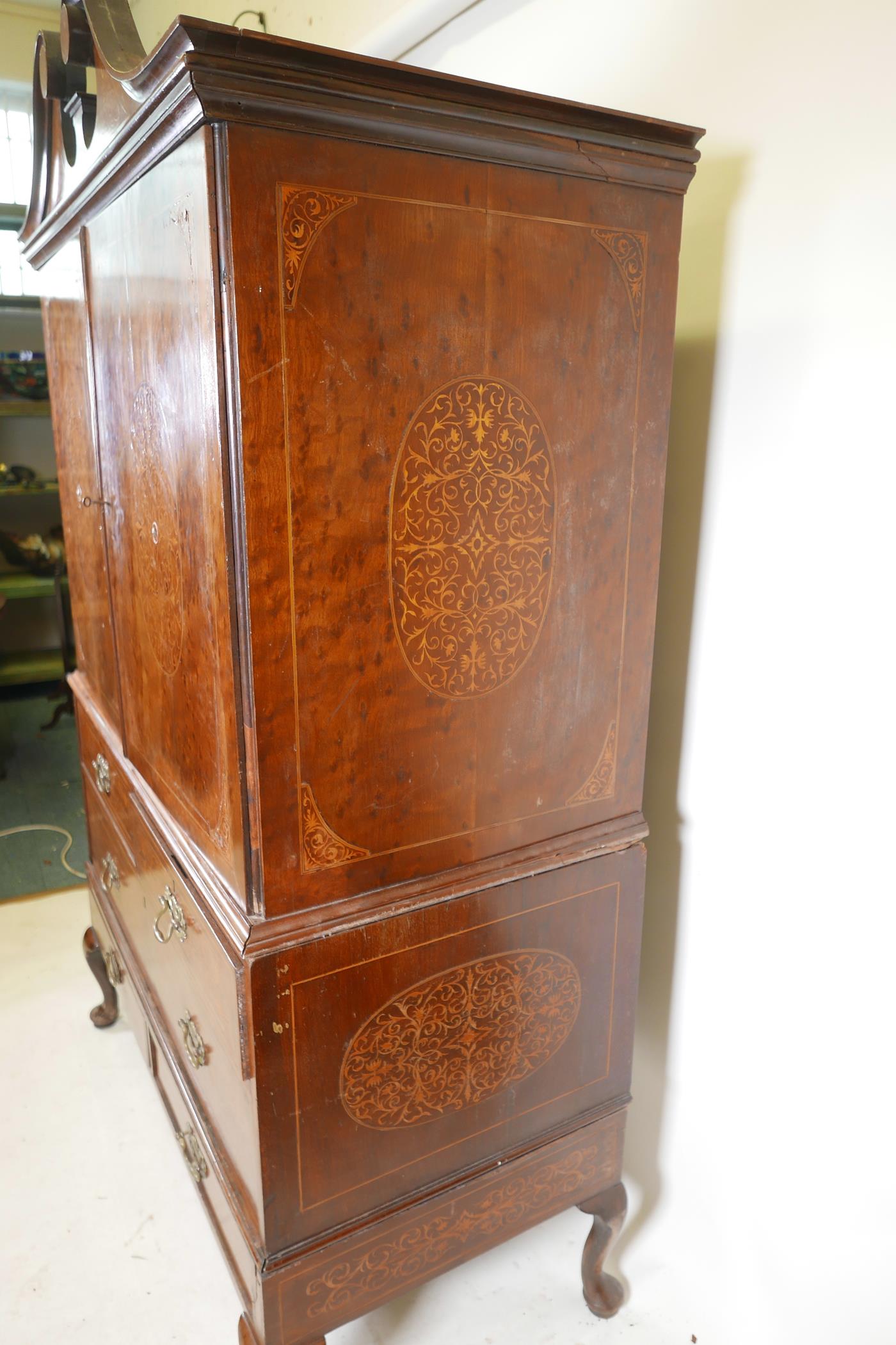 A C19th plum pudding mahogany press cupboard, with inlaid seaweed panel panels, the upper section - Image 3 of 5