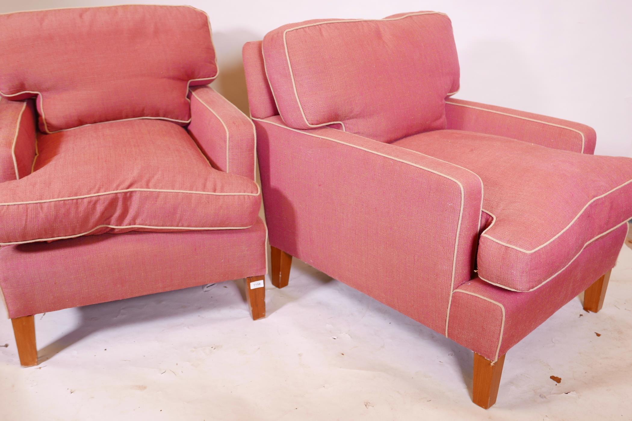 A pair of deep back contemporary armchairs, raised on tapering supports, each with a footstool, - Image 4 of 4