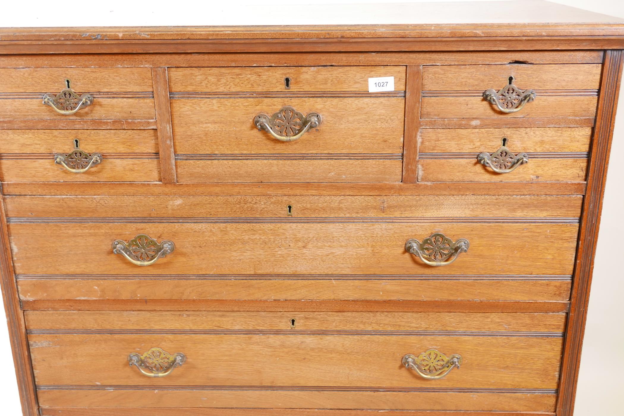 A 1920s walnut chest of drawers, five small over three long drawers, with reeded decoration, 41" x - Image 2 of 3
