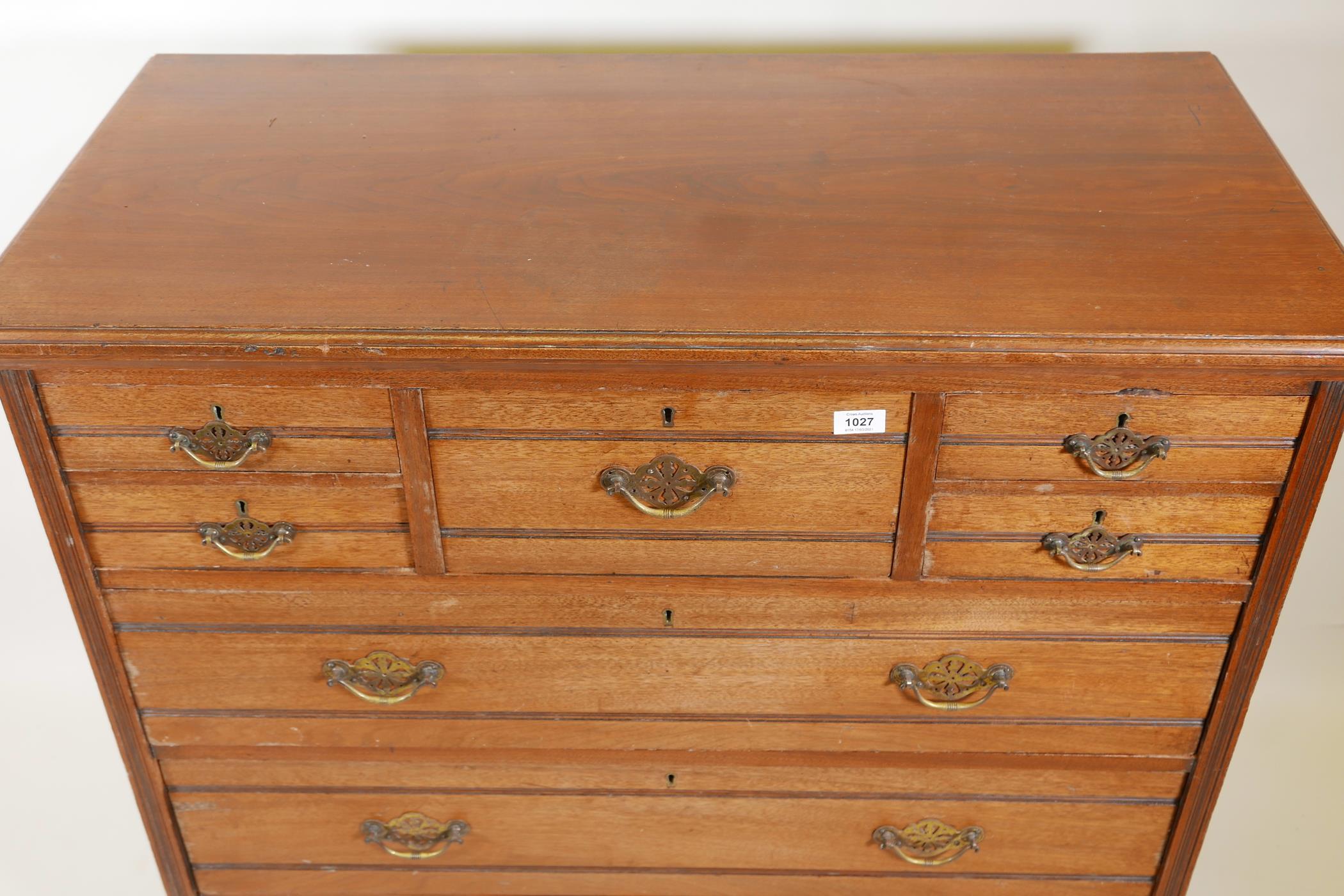 A 1920s walnut chest of drawers, five small over three long drawers, with reeded decoration, 41" x - Image 3 of 3