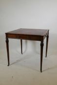 An American Federal style inlaid mahogany centre table, with leather inset top and cupped corners,