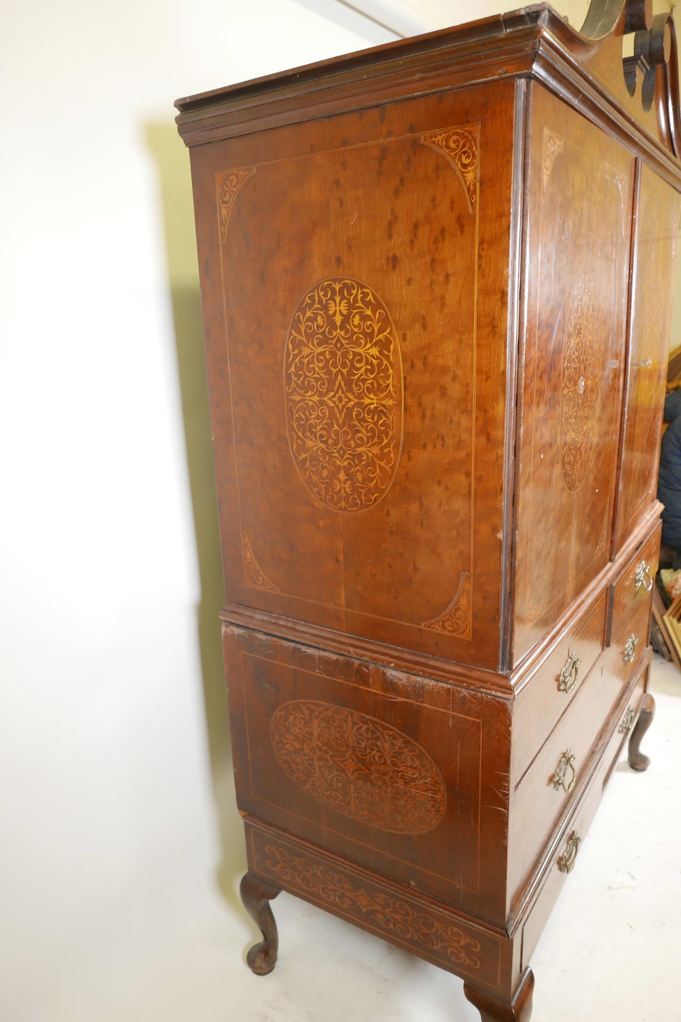 A C19th plum pudding mahogany press cupboard, with inlaid seaweed panel panels, the upper section - Image 2 of 5
