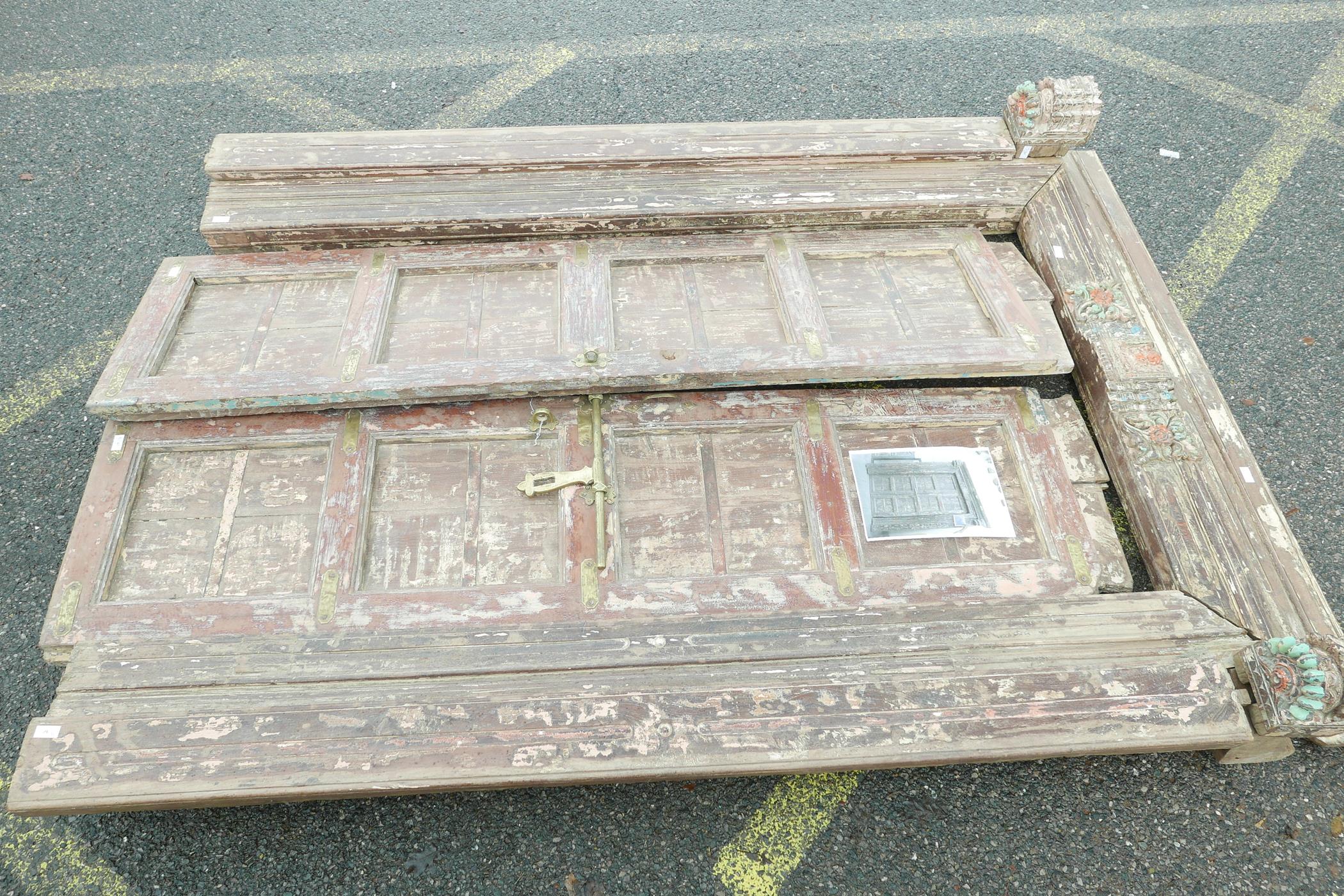 Architectural salvage: A pair of Indian teak storm doors and frame, with carved details, each door - Image 5 of 6