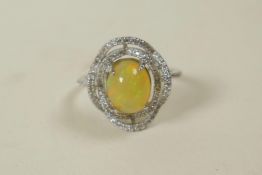 A 925 silver, opal and cubic zirconium dress ring, approximate size 'O'