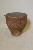 An African animal hide tribal drum, 18" high