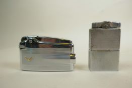 A 1930s Ronson De-Light 'Grenadier' cigarette lighter in engine turned silver metal, make and